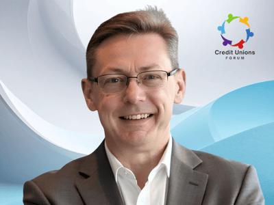 Greg Cook smiling in a gray blazer in front of a blue graphic backdrop with the Credit Unions Forum logo